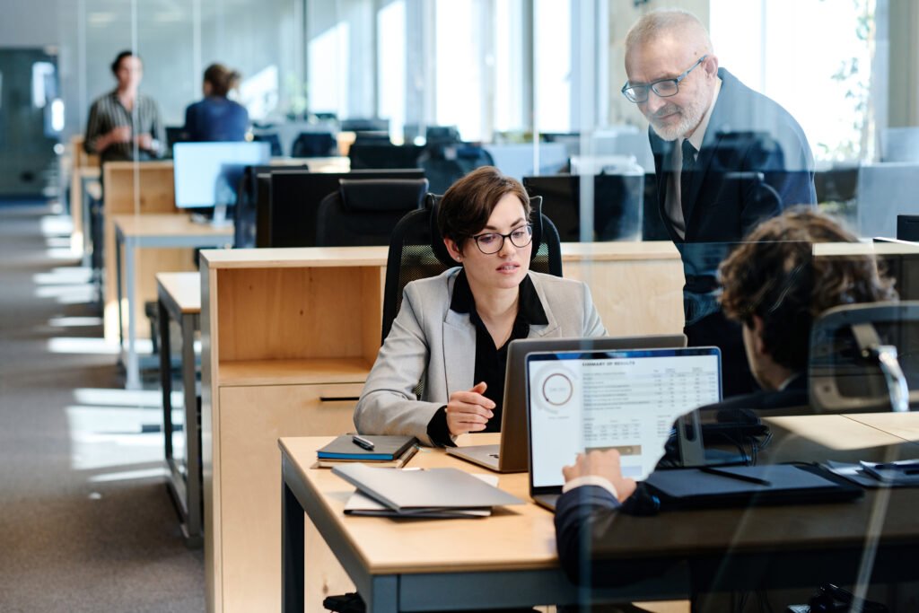 A professional looking calm and relaxed at work, representing stress and burnout relief.