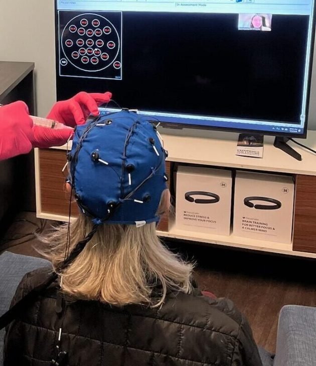 The modern and professional clinic interior of Optimum Peak Neurofeedback.